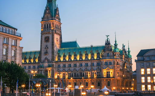 A city with a large building and a river screenshot 1