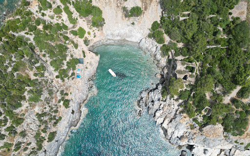 Blue rock beach and sea screenshot 1