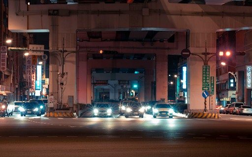 Cars at an Intersection during Night Time screenshot 1
