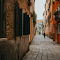 Charming Venetian Street Scene with Bridge logo