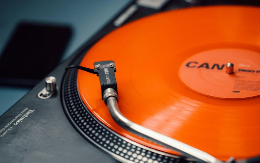 Close-up Photo of an Orange Vinyl Record screenshot 1