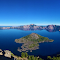 Crater Lake Under a Deep Blue Sky logo