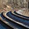 Curved train tracks logo