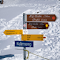 Directional Signages on Snowy Rigi Kulm Trail logo