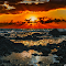 Dramatic Sunset Over Rocky Shore logo