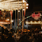Festive Christmas Market Carousel at Night logo
