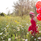 Girl and red balloons logo