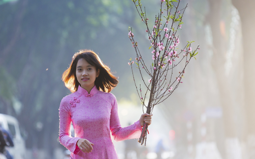 Girl holding a peach branch screenshot 1
