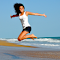Girl jumping on the beach logo
