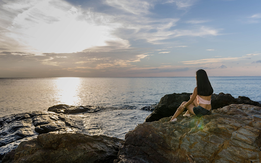 Girl looking out to sea screenshot 1