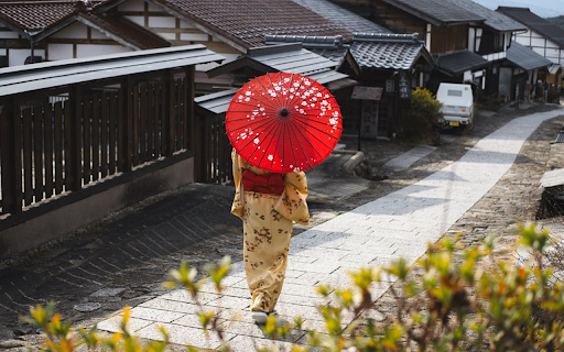 Japanese girl holding a red umbrella walking screenshot 1