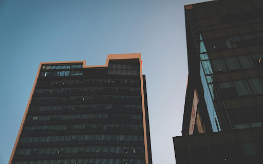 Modern tall business centers with glass facades screenshot 1