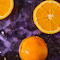 Oranges on Deep Purple Water logo
