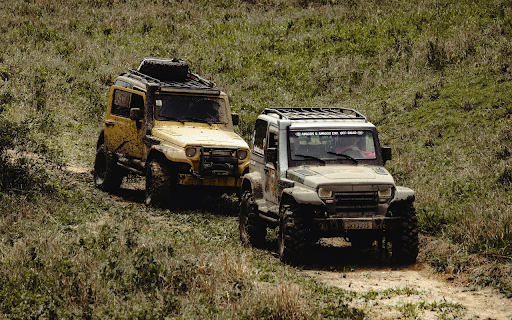 Photo of Terrain Cars on a Dirt Road screenshot 1