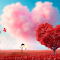 Pink tree and pink clouds logo