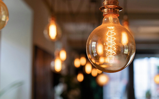 Retro light bulb glowing in bar screenshot 1