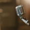 Retro Microphone Close-up logo