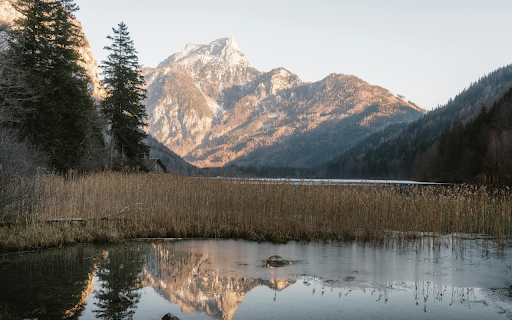Serene Mountain Lake Reflection in Austria screenshot 1