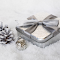 Silver Gift Box with a Silver Christmas Pinecone logo