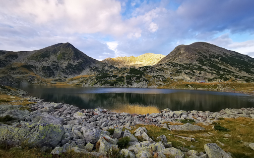 Small tent next to the mountain and lake screenshot 1