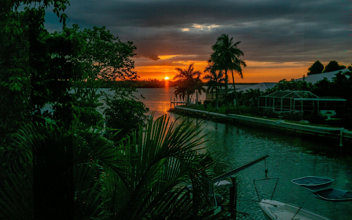 Sunset scene on blue lake screenshot 1