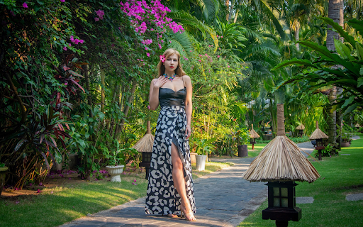 The girl stood under the bougainvillea tree screenshot 1