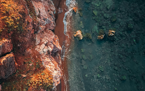 Top View of Rocks on Sea Shore screenshot 1