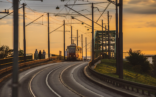 Tram Crossing at Golden Hour screenshot 1
