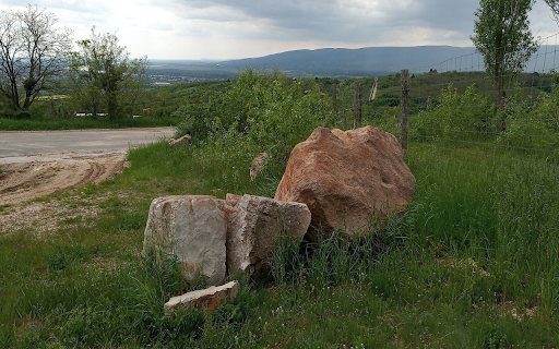Two large rocks on the side of the road screenshot 1