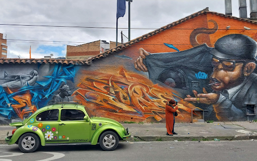 Vibrant Urban Street Art with Vintage Car screenshot 1