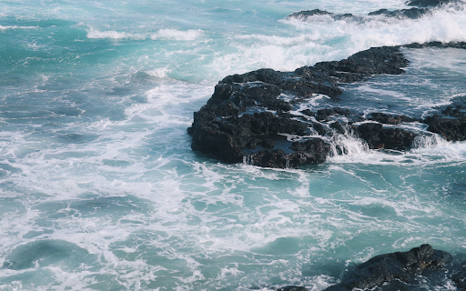 Waves crashing against rocks screenshot 1