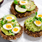 Wholesome Delight: Multigrain Bread with Avocado & Boiled Eggs Theme logo